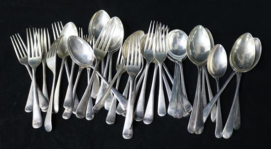 A matched part canteen of silver Old English pattern flatware by Viners Ltd, Sheffield, 1947 and later. 70 oz.